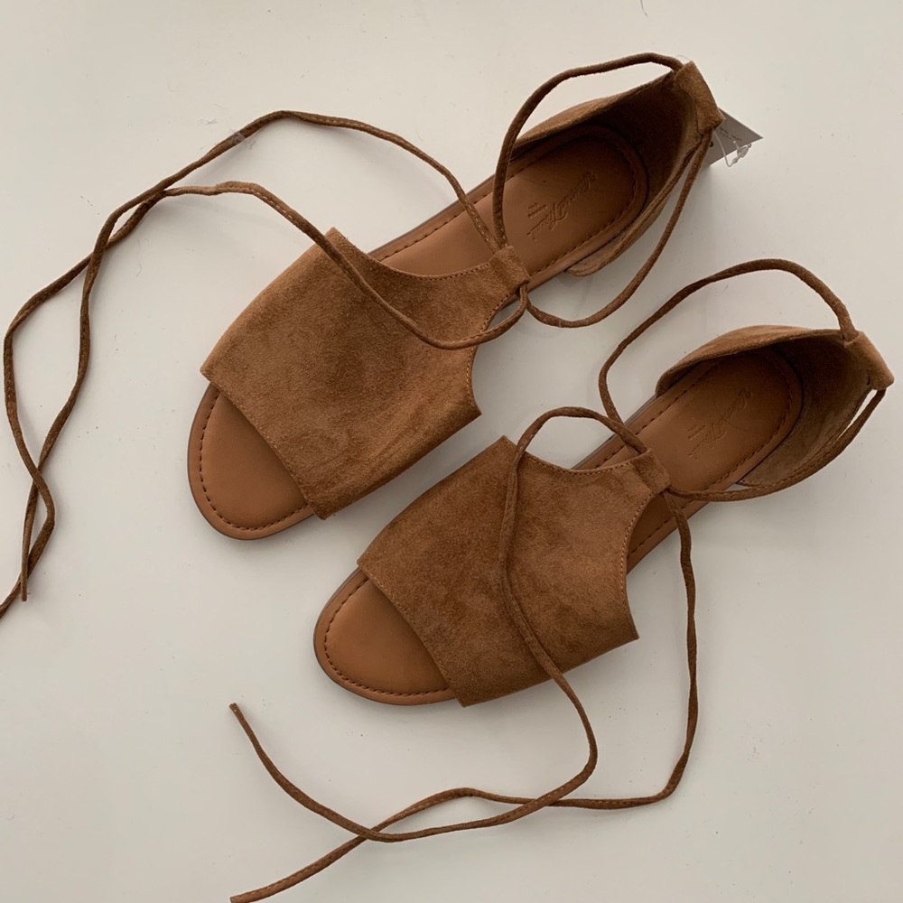 Brown suede lace-up flats